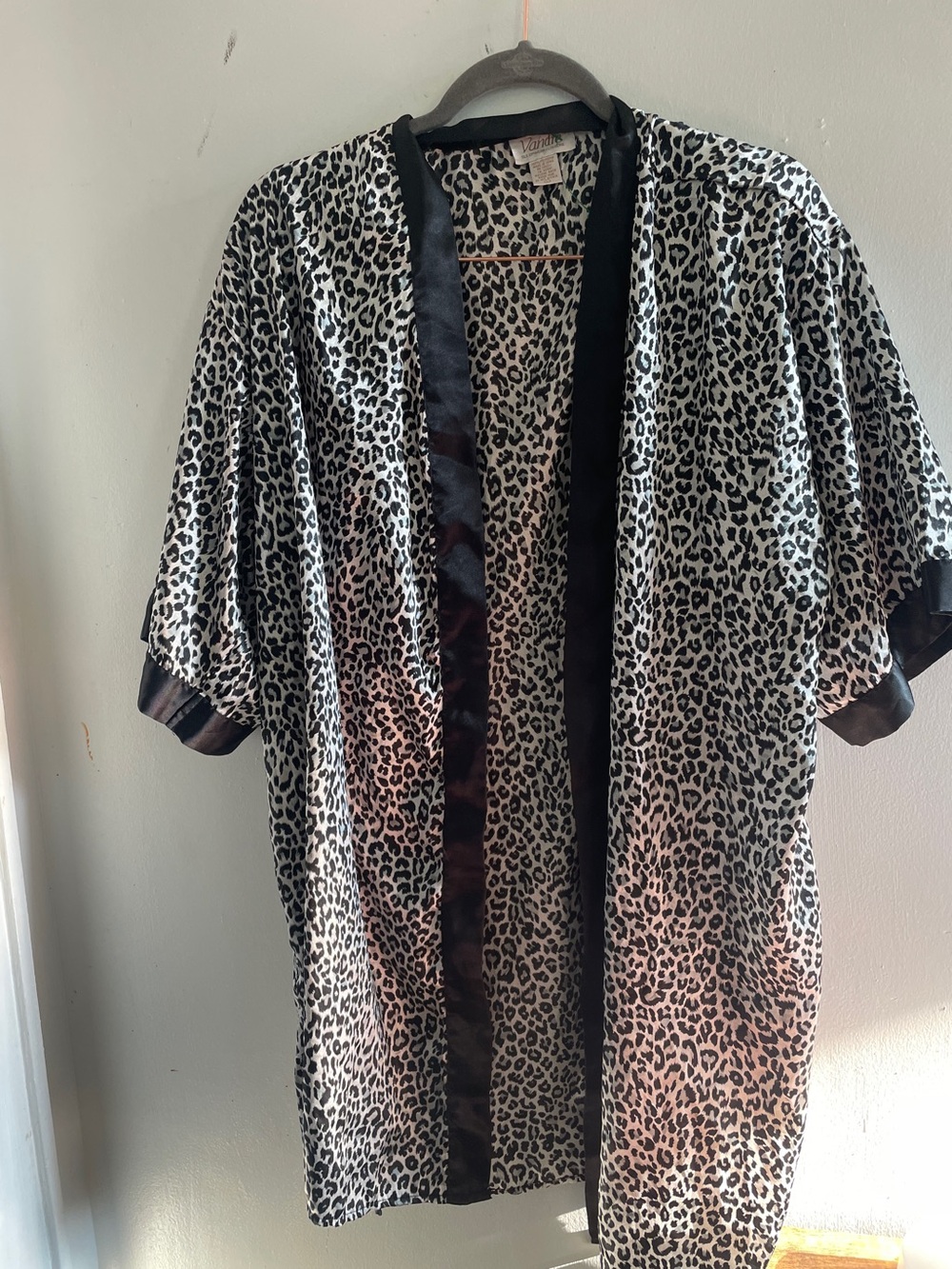 Vandre brand sleepwear leopard print robe with a black satin trim.